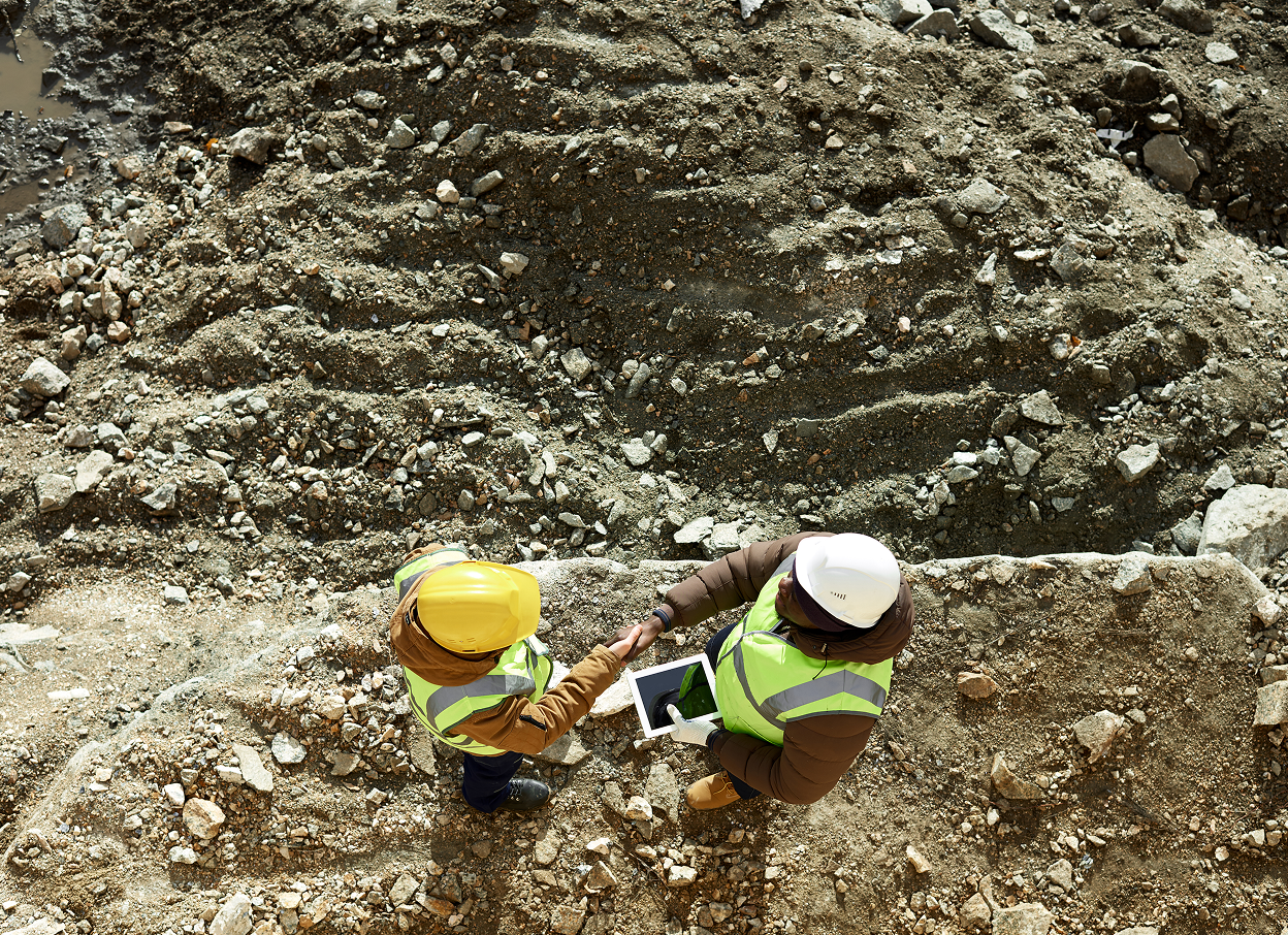 Two workers at a precious metals mine
